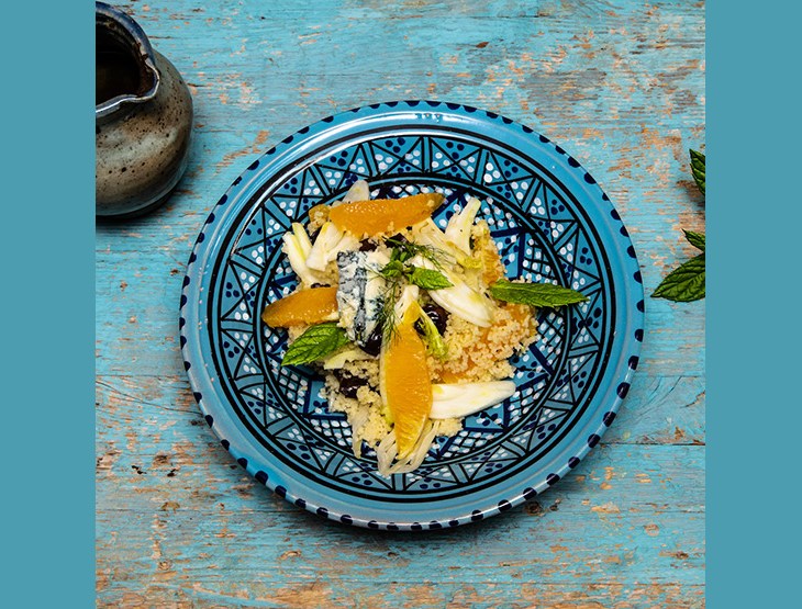 Couscous con gorgonzola piccante, arance, olive taggiasche